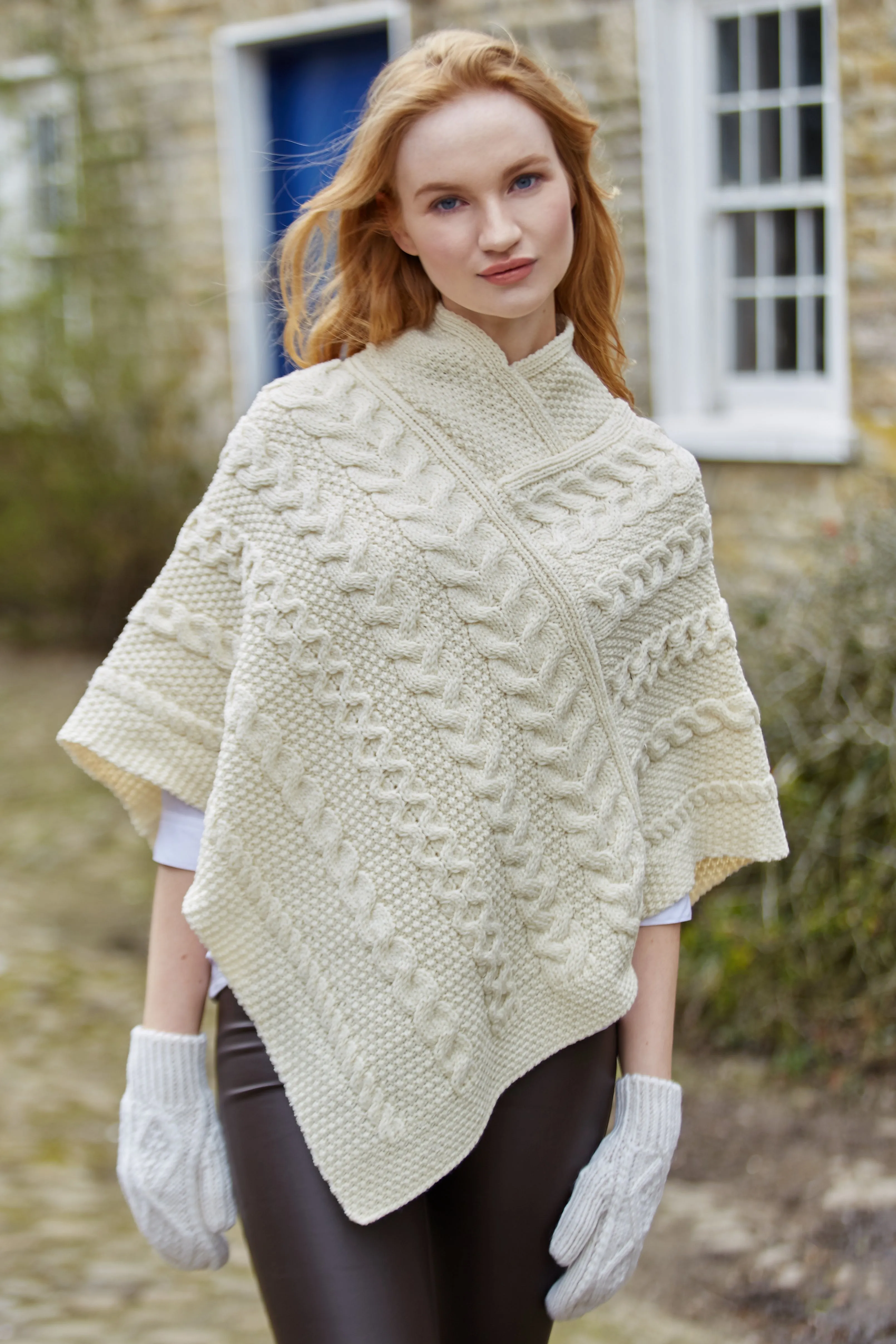 LADIES ARAN PONCHO WITH CABLE AND MOSS STITCHING