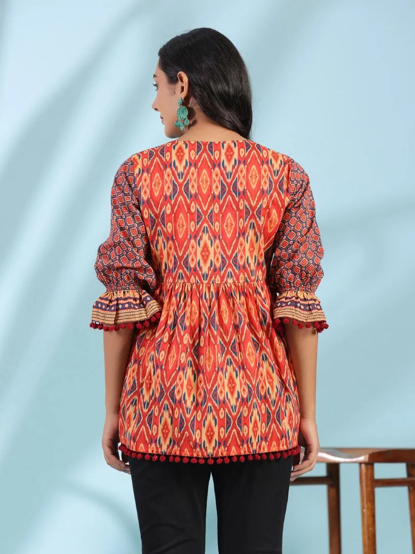 Women Ikat Printed & Embroidered Orange Cotton Voile Peplum Tunic