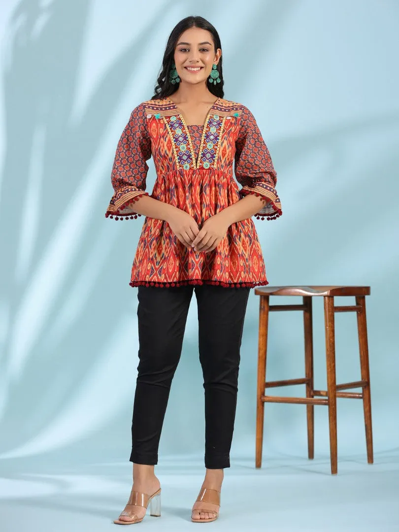 Women Ikat Printed & Embroidered Orange Cotton Voile Peplum Tunic