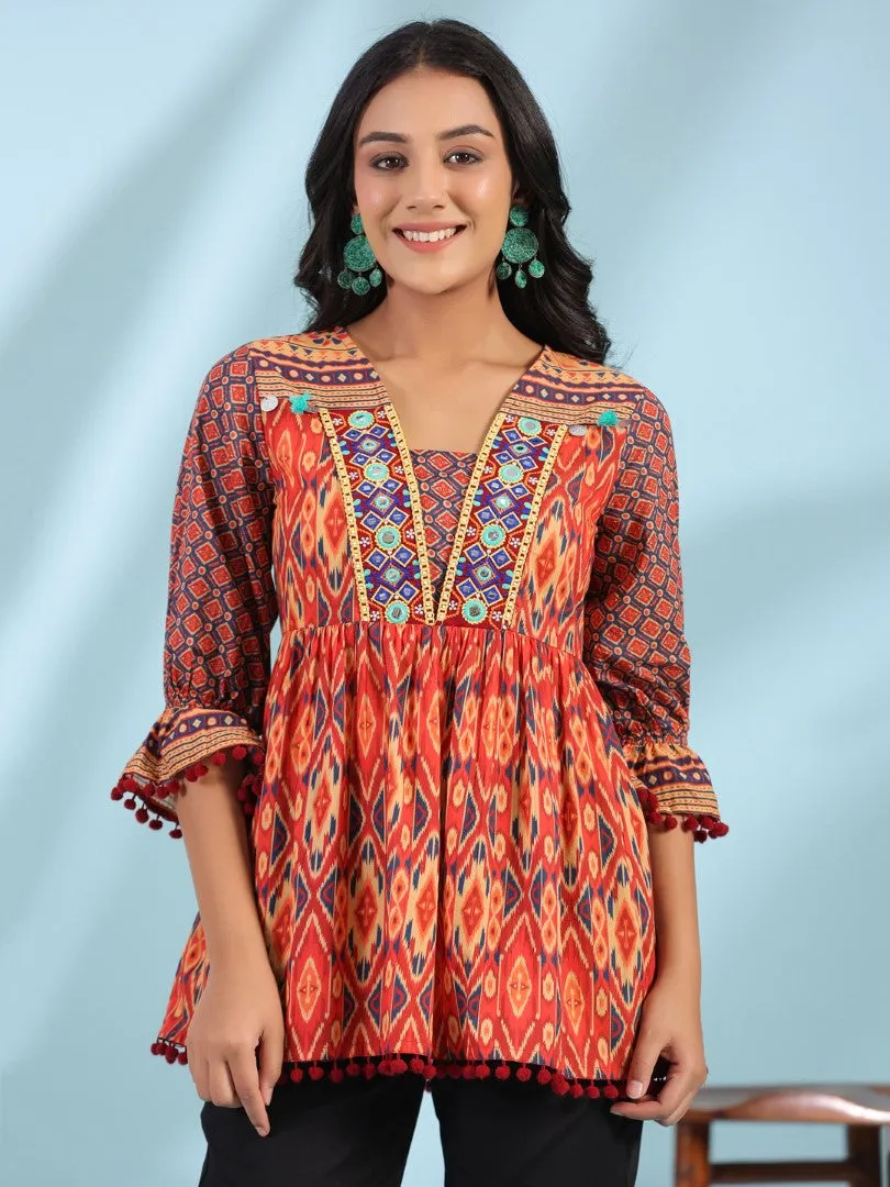 Women Ikat Printed & Embroidered Orange Cotton Voile Peplum Tunic